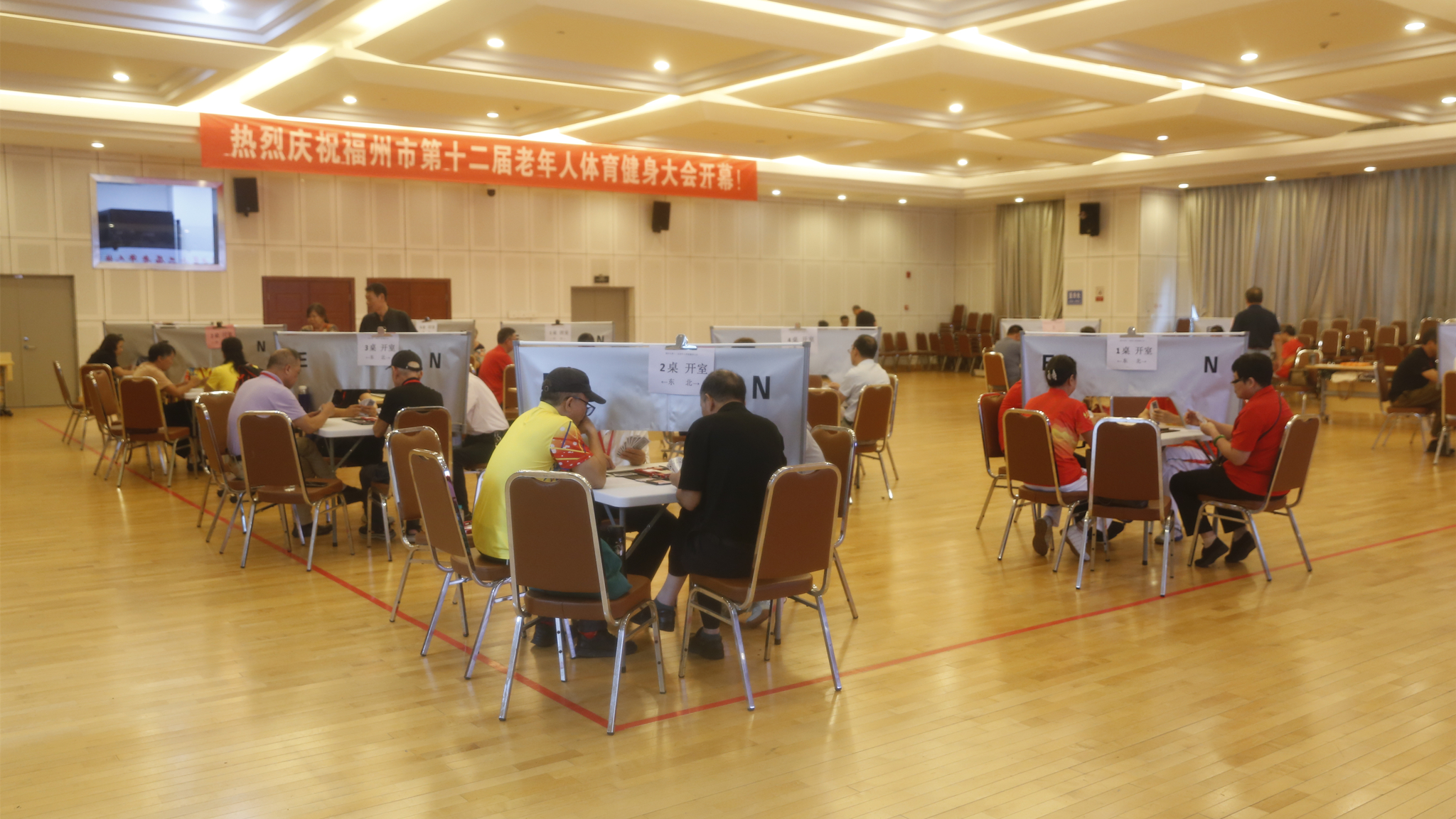 “牌”兵布阵展技艺 “棋”乐融融显风采 市第十二届老健会棋牌交流活动成功举办